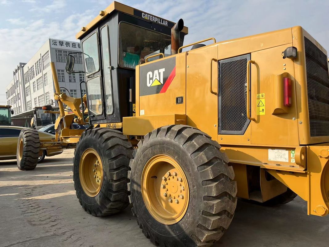 Χρησιμοποιούμενο Caterpillar Motor Grader 140K σε αποθεματικό μεταχειρισμένο Cat 140 Motor Grader